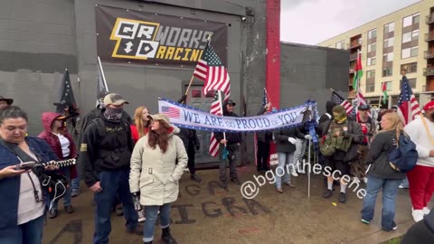 A pro-ICE group arrives across from the Portland ICE facility