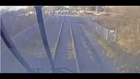 GO train striking dump truck at a Markham, Canada railway crossing