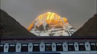 The moment when Mount Kailash glows in golden sunrise light