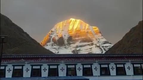 The moment when Mount Kailash glows in golden sunrise light
