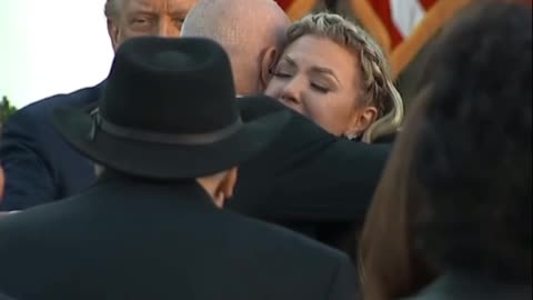 An emotional moment between Erika Kirk and her father