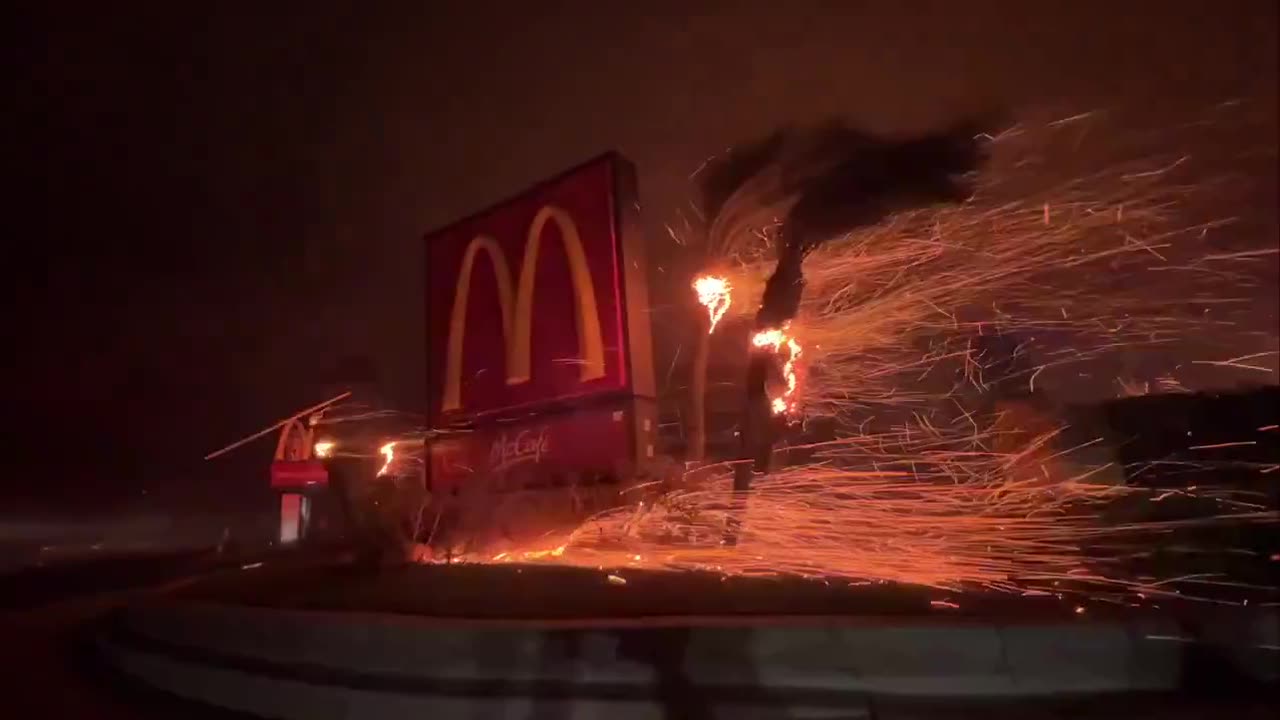 ICONIC APOCALYPTIC SCENE, FIERCE WIND EMBERS BURN AROUND McDonalds CA