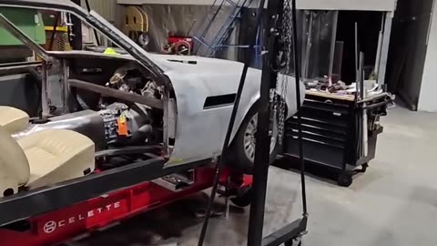 Aston Martin DBS undergoing a full restoration by Retro power cars set up on a Celette bench..