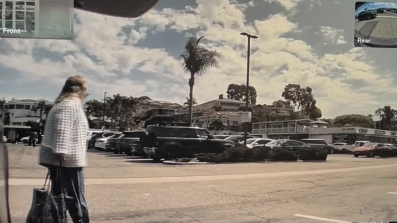 Car And Driver Fail To Detect Aimlessly Standing Woman