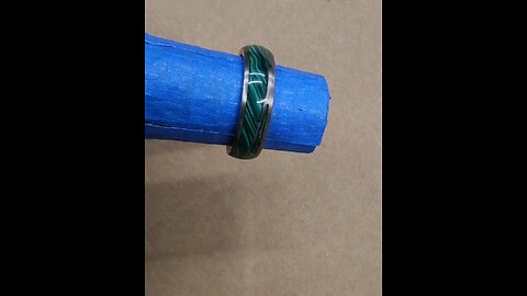 A Malachite twist titanium ring