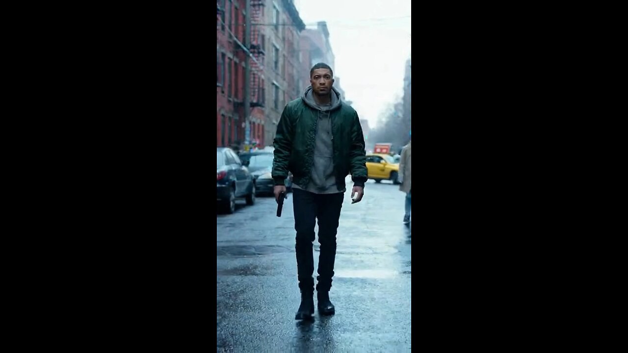 Man walking around with gun in the city