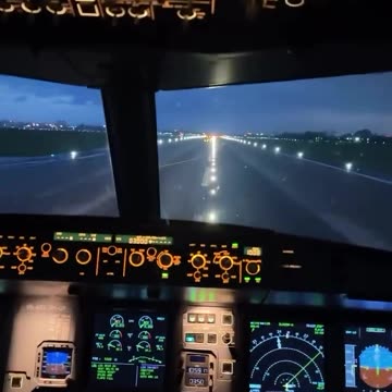 Evening landing from the cockpit of an Airbus A321 at Saigon airport, Vietnam.