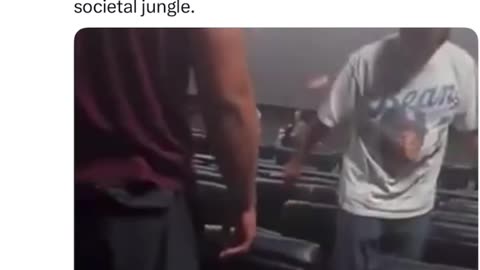 Negro in theater pisses on man's son. The father takes care of business.