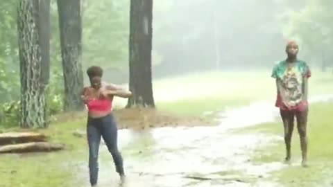 Serious Punches In The Rain As Two Girls Fights In the Rain