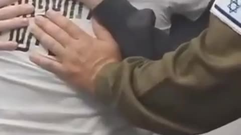 Straight to the heart: Tal Kuperstein stands up to hug his son Bar