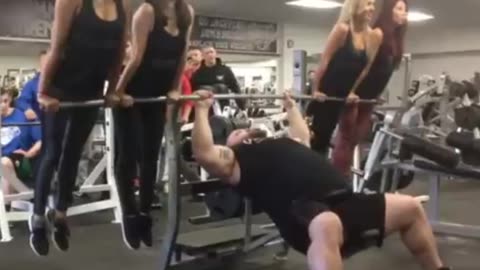 Eddie Hall Bench Presses 4 Girls