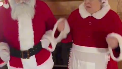 Mr & Mrs Clause Doing Trump Dance