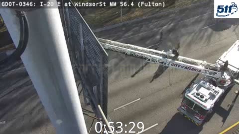 Georgia: Pedestrian Climbs On Top Of Interstate Sign & Is Eventually Removed By Fire Department