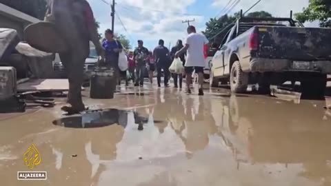 Mexico flooding death toll rises to 64 with dozens still missing