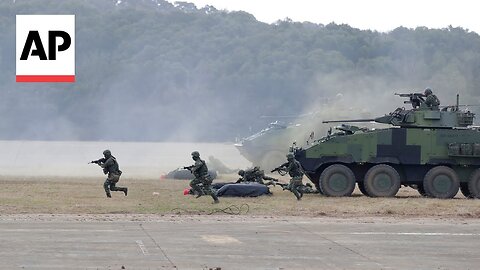 Taiwan armored vehicles and attack helicopters hold drills to repel enemy infiltration