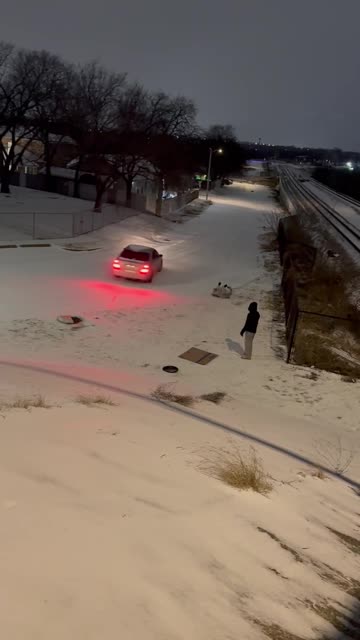 Texas Sledder Has Extremely Close Call With Swerving Vehicle