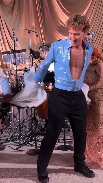 Mark Zuckerberg ditched his suit and performed in a blue jumpsuit at his wife's 40th birthday.