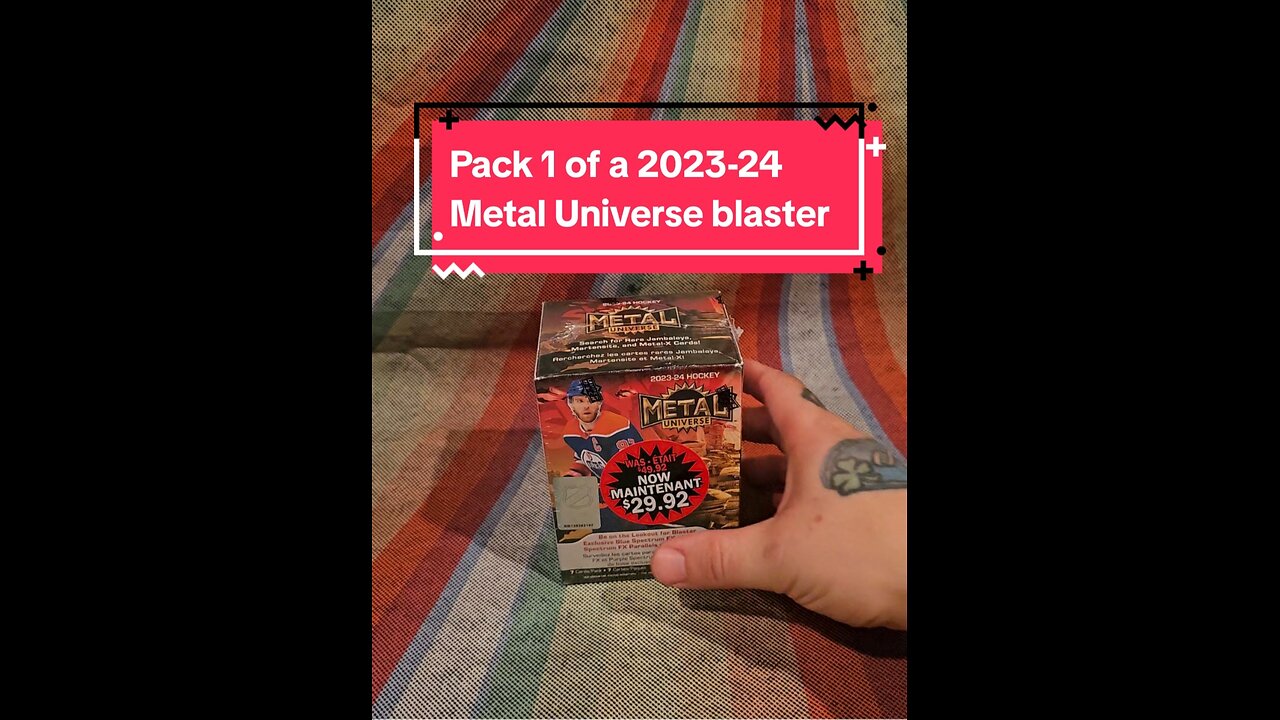 Pack 1 of a 2023-24 Skybox Metal Universe blaster