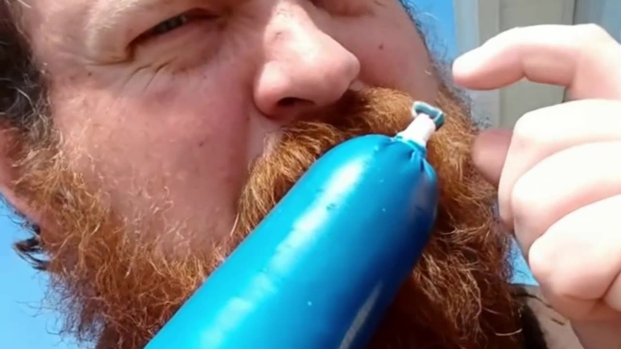 Jeffrey Michael Hyatt Lets Big Blue Spray His Face