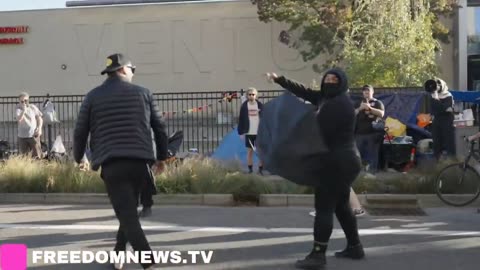 Confrontations outside of Portland ICE Detention Center after a driver says a protester spit on him. 