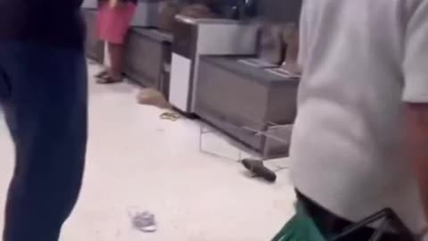 Black man savagely attacks people in store
			