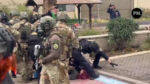Federal police make several arrests outside the ICE facility in Portland.