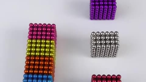 The tiny magnetic balls perfectly attach to each other. #asmr #satisfying #shrots