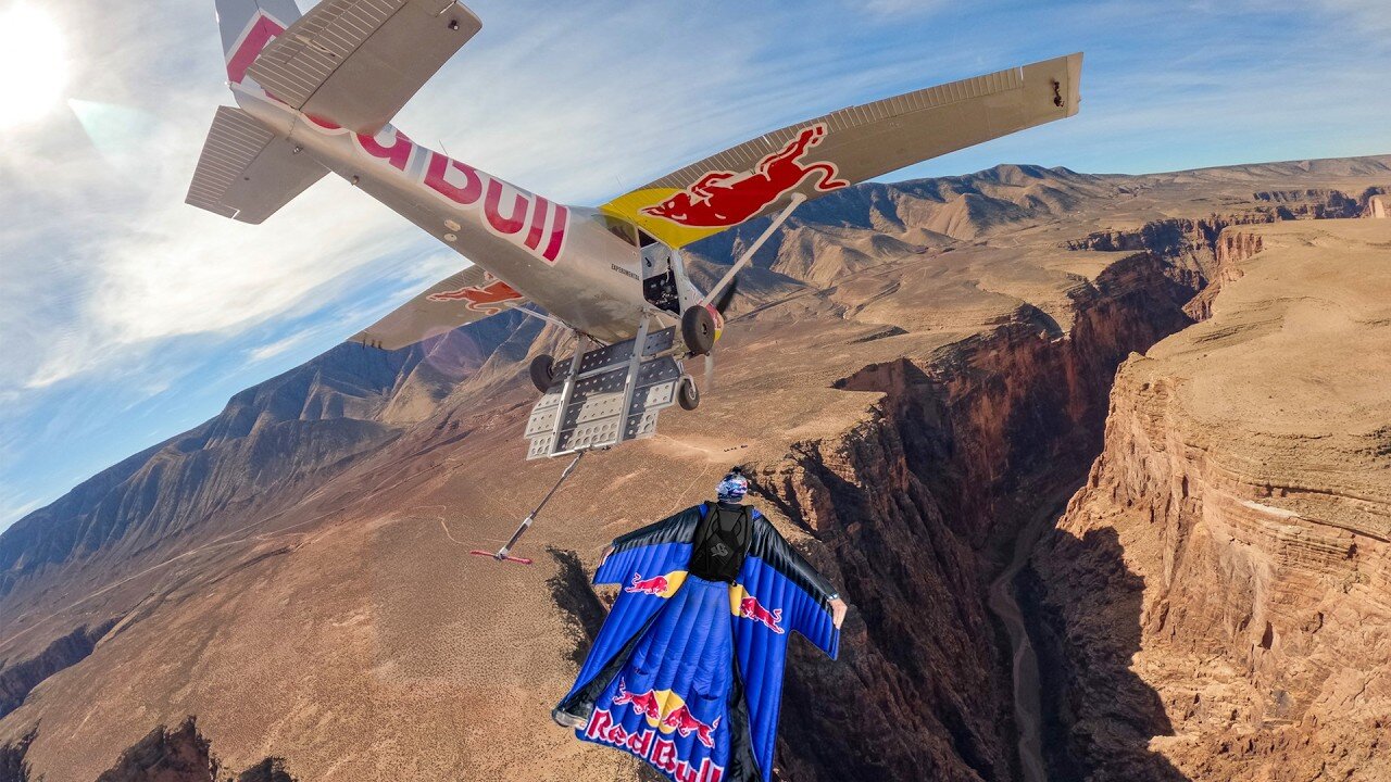 World First: Skydiver Hooks Onto a Plane In A Canyon! 🇺🇸