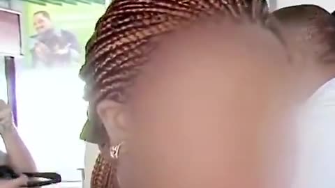 A scamming Nigerian mother, 7 weeks away from giving birth is stopped at a British Air...