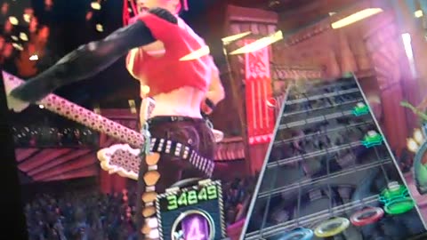 MY GRAND DAUGHTER MASTERS GUITAR HERO, SHE_S IN