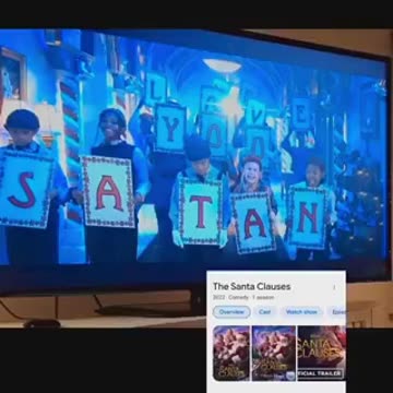 Disney Christmas comedy in which children hold the sign "We Love You Satan"