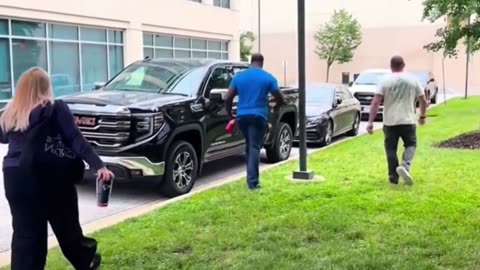Federal agents detain a female outside of a courthouse. An agent tells a Corpulent Karen 