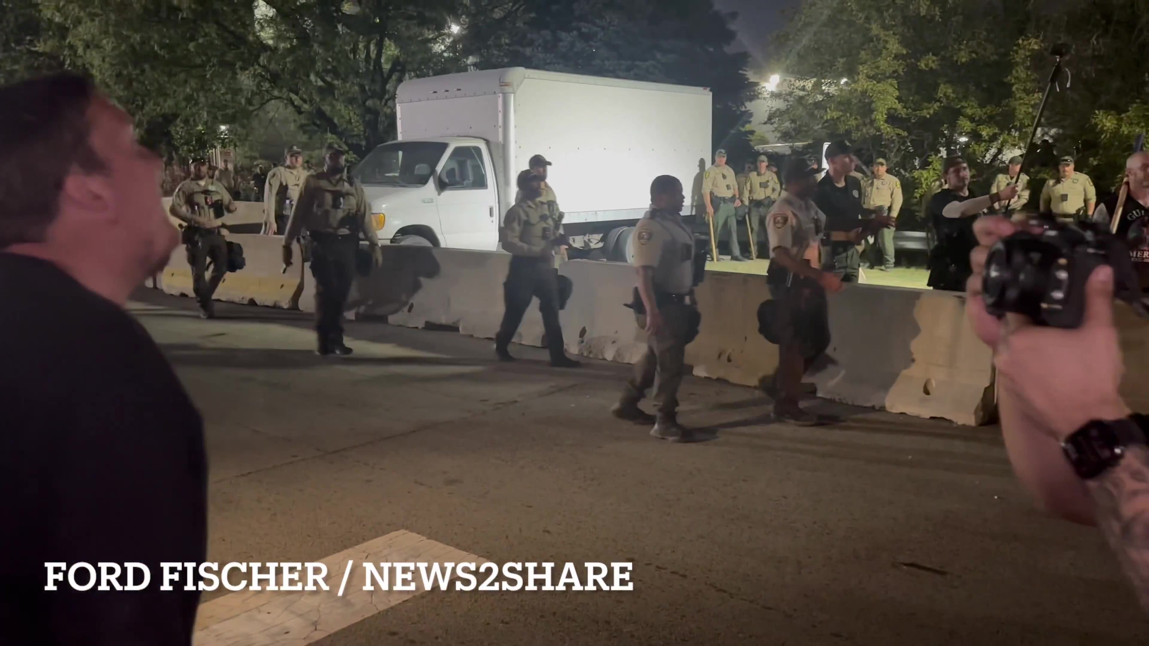 As a Trump supporter wades into anti-ICE protesters outside Broadview ICE facility,