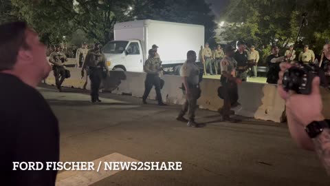 As a Trump supporter wades into anti-ICE protesters outside Broadview ICE facility,