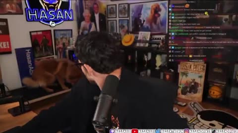 Hasan Piker electrocutes a dog when it refuses to lie down politely as a backdrop for his broadcast.