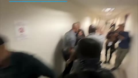 ICE officer caught on camera assaulting distraught woman after husband arrested