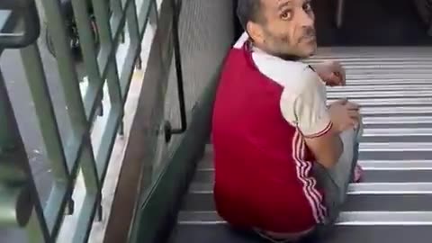 French woman catches an immigrant trying to steal her scooter