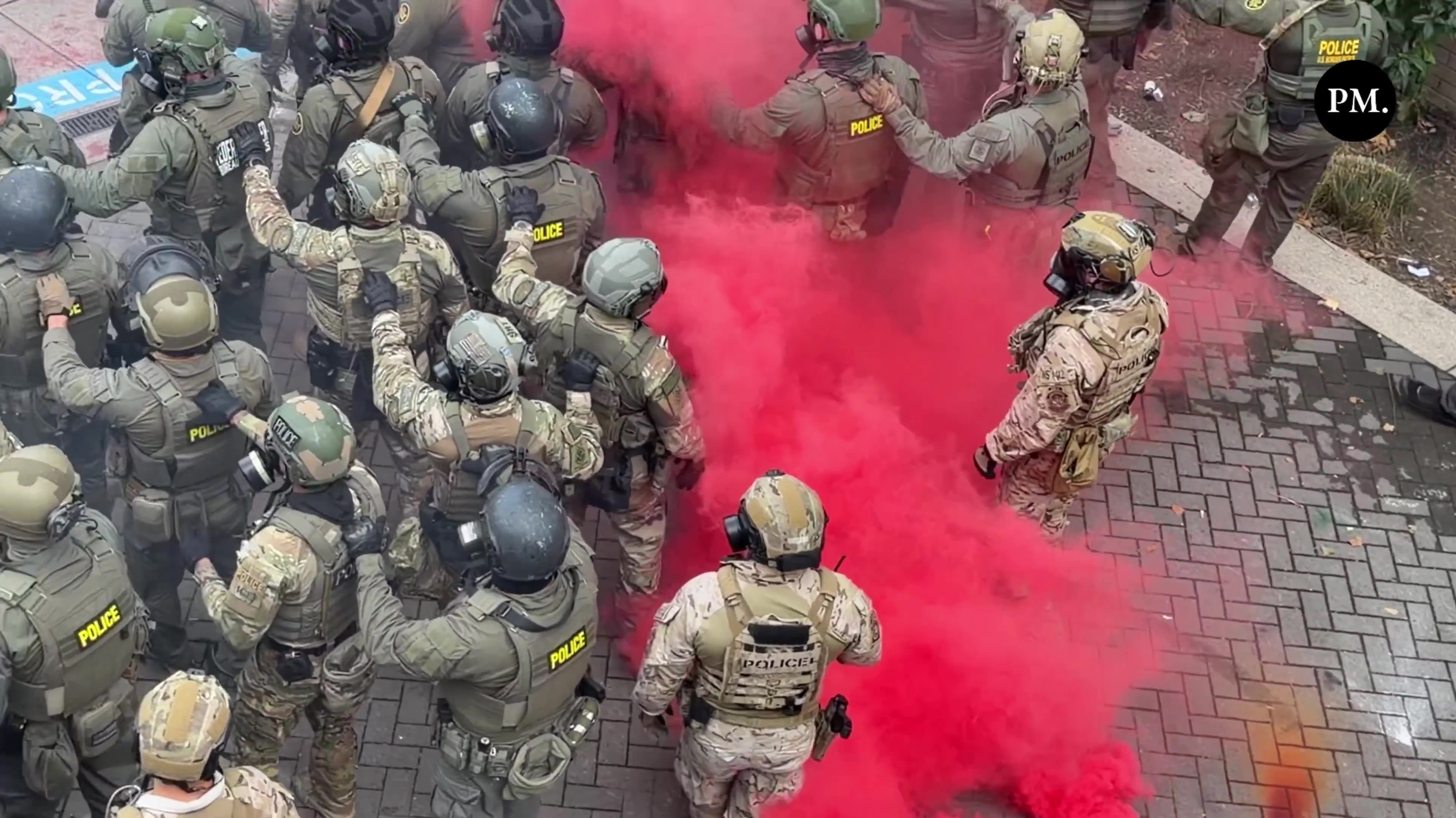 Katie Daviscourt Portland, Ore. — A Blackhawk helicopter flys above the ICE facility