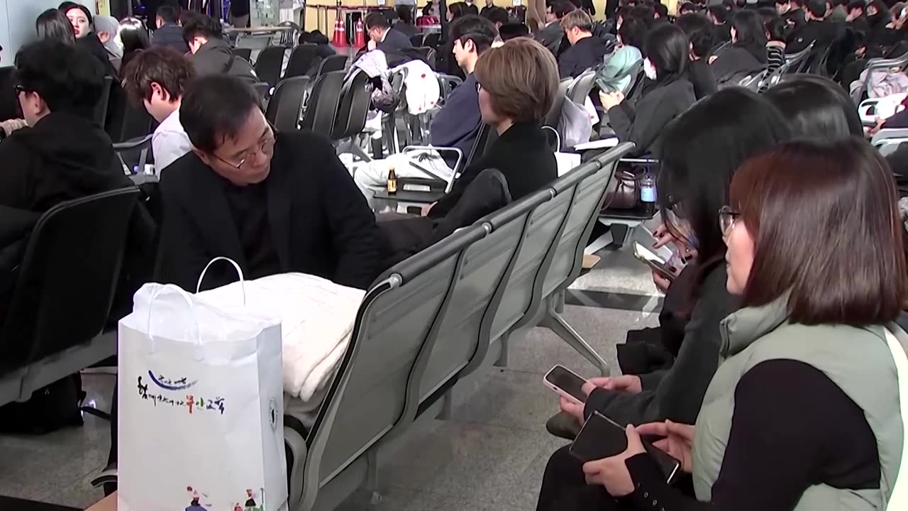 Empty desks mark five colleagues killed in South Korea plane crash