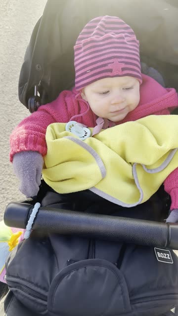 kayla and mommy out with the stroller — it’s cold!