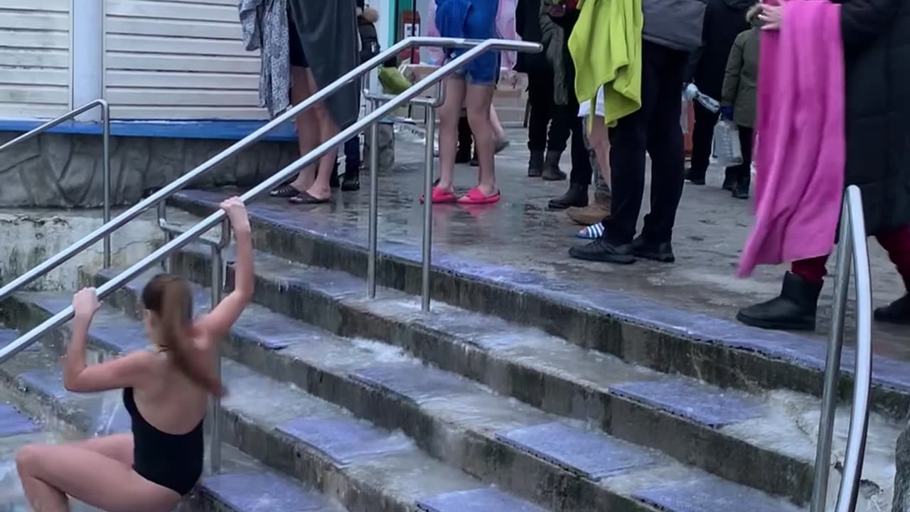 Girl Slips Down Stairs Walking Into Pool
