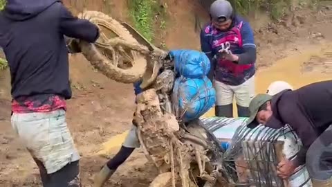 motorbikes and jeeps through muddy roads