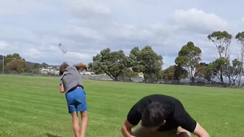 Girl and man kicks battle