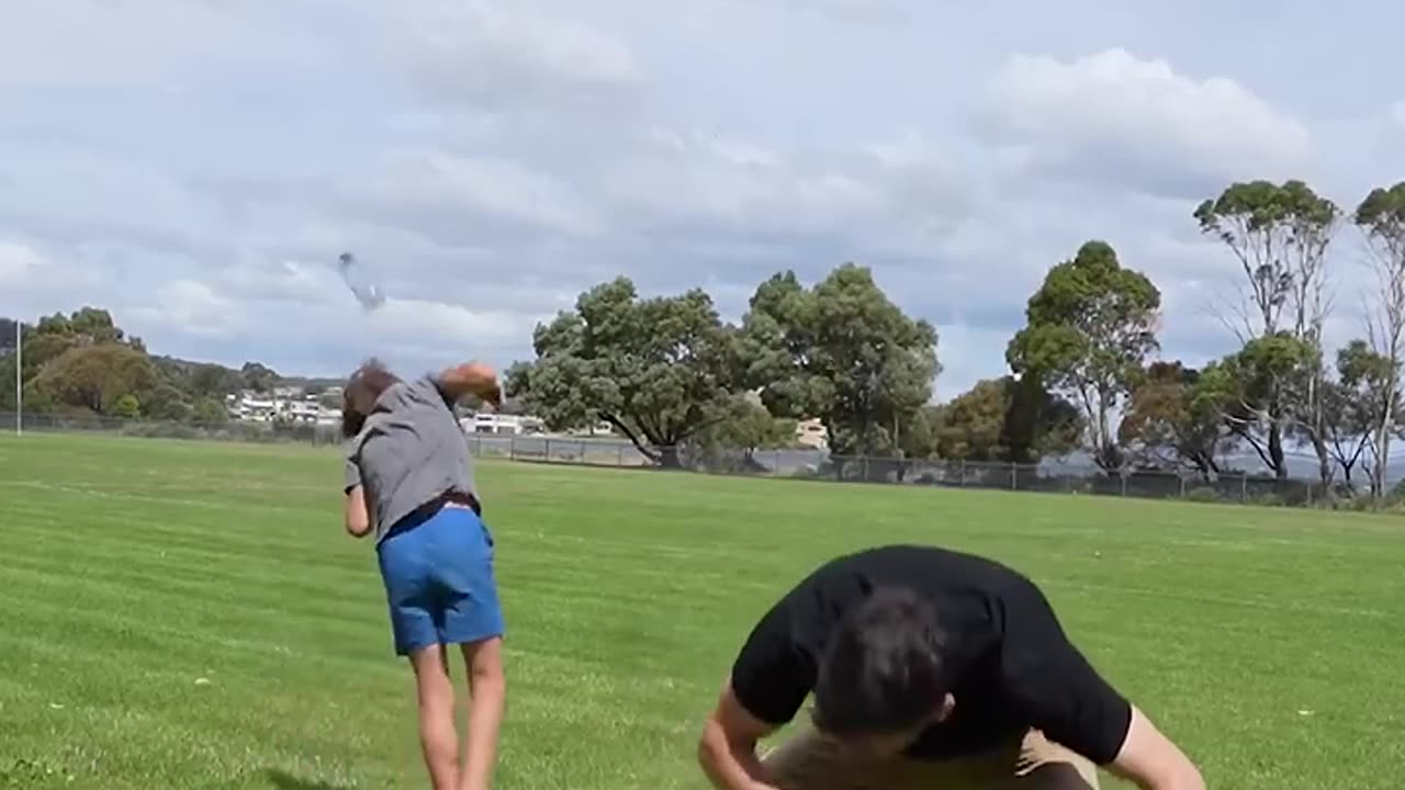 Girl and man kicks battle