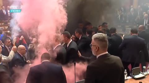 Serbian Opposition Throw Smoke Grenades and Tear Gas at Fellow Members of Parliament