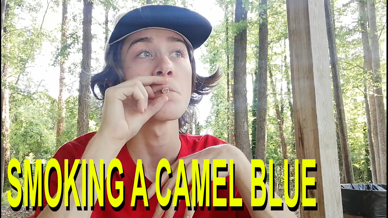 Smoking a Camel Blue Cigarette in Nature