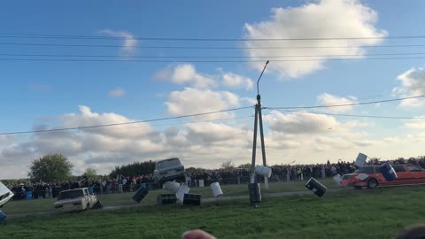 Limousine Knocks Down Car Towers
