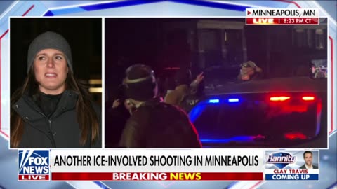 Protesters gather around the scene of a second ICE involved shooting