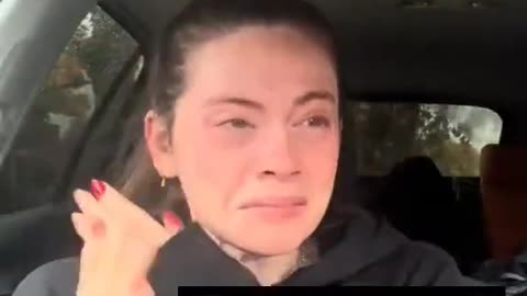 Irish woman breaks down after opening a notice of eviction.