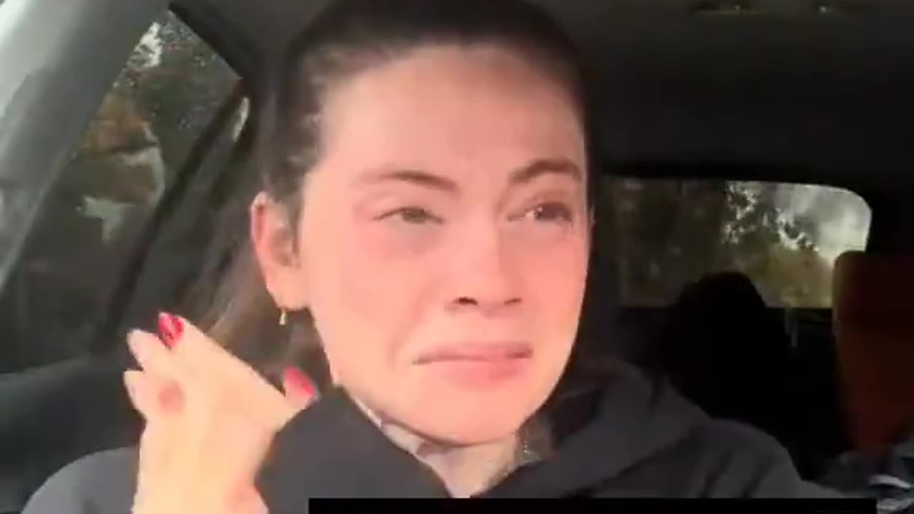 Irish woman breaks down after opening a notice of eviction.